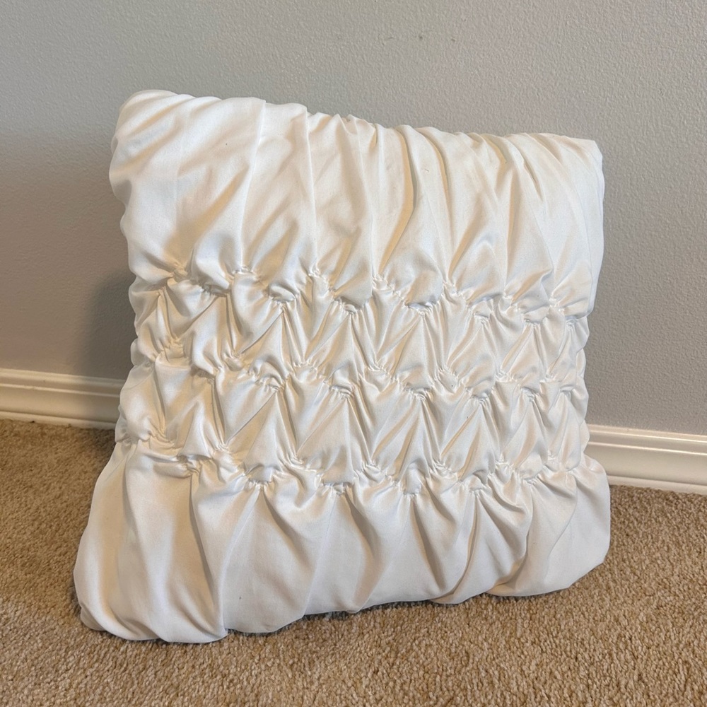 white dainty throw pillow